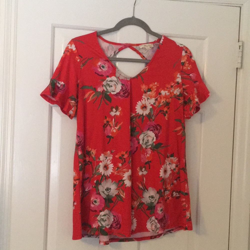 Bright red floral blouse
